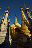 Inle Lake Myanmar. Indein, on the summit of a hill the  Shwe Inn Thein Paya a cluster of hundreds of ancient stupas. Many of them are ruined and overgrown with bushes. 